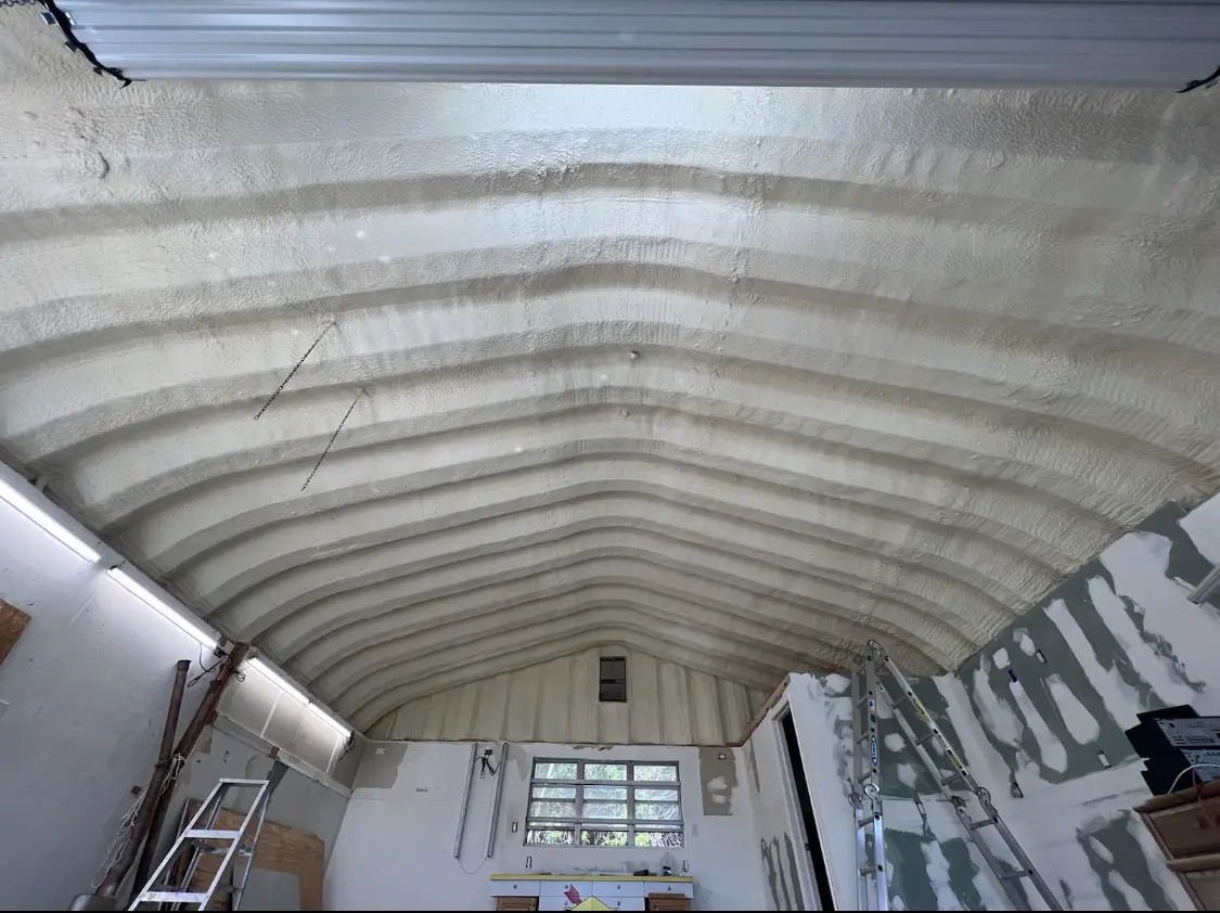Spray polyurethane foam applied to the underside of a metal roof deck in Tredyffrin